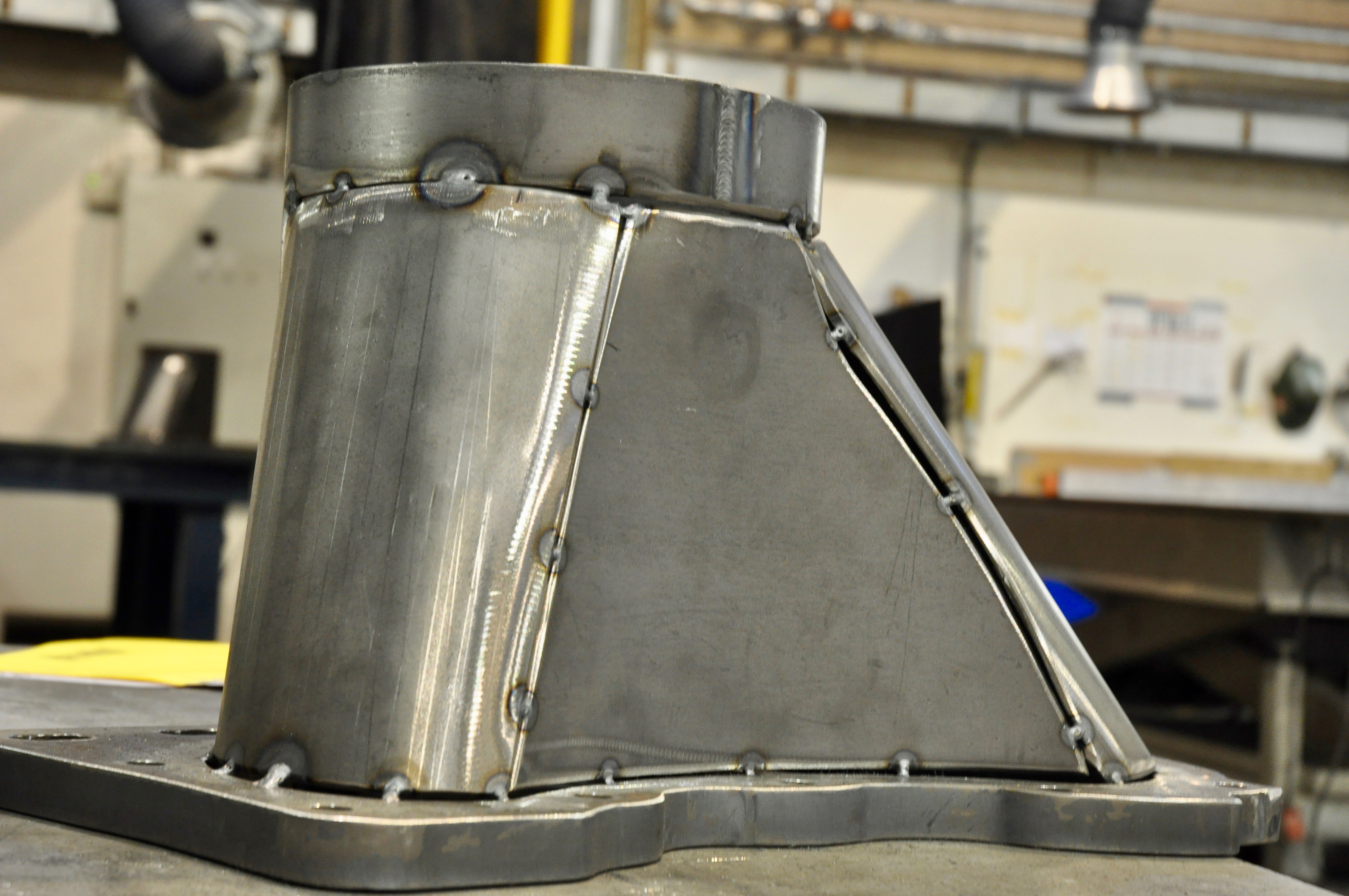 Welded exhaust manifold component